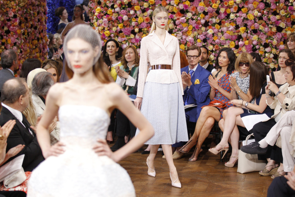 Models present creations by Belgian designer Raf Simons as part of his Haute Couture Fall-Winter 2012/2013 fashion show for French house Dior in Paris